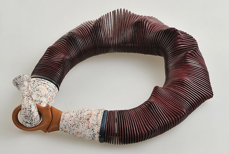 Liv Blåvarp, 'Bergets stemme', 2013. Necklace. Amaranth, peroba rosa, painted maple, brass, polyester cords. Photo: Tom Hansen.